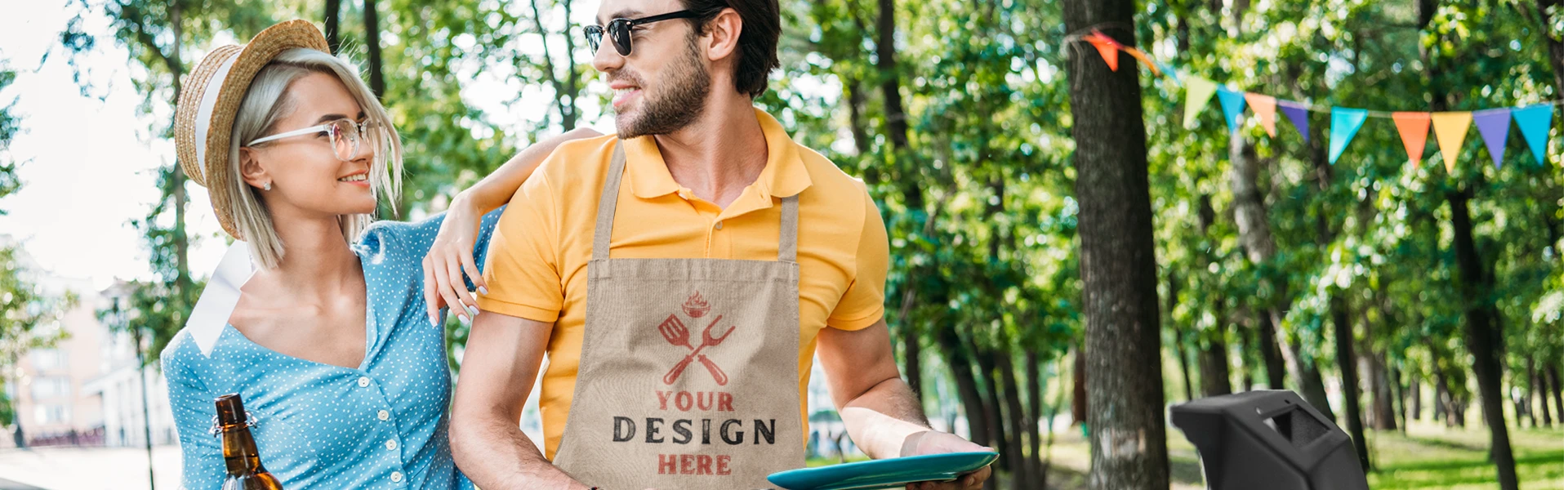  A man wears a personalized apron and barbecues.